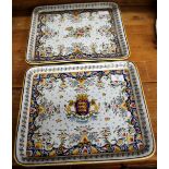 TWO RECTANGULAR FRENCH DIEPPE FAIENCE TRAYS with flower decoration, one with a coat of arms for