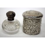 A SILVER TOPPED OVOID CUT GLASS SCENT BOTTLE together with a Victorian silver cylindrical dressing