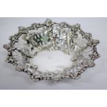 A VICTORIAN SILVER PIERCED BONBON DISH with cast foliate decoration to the shaped rim, makers mark