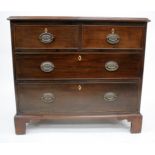 A GEORGIAN MAHOGANY STRAIGHT FRONT CHEST of two short and two long drawers on bracket feet 89cm wide