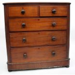 A VICTORIAN MAHOGANY CHEST OF TWO SHORT AND THREE LONG DRAWERS with turned knob handles, 105cm