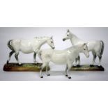 A ROYAL DOULTON PORCELAIN FIGURINE OF A HORSE, HN2569 gude grey mare, together with a further