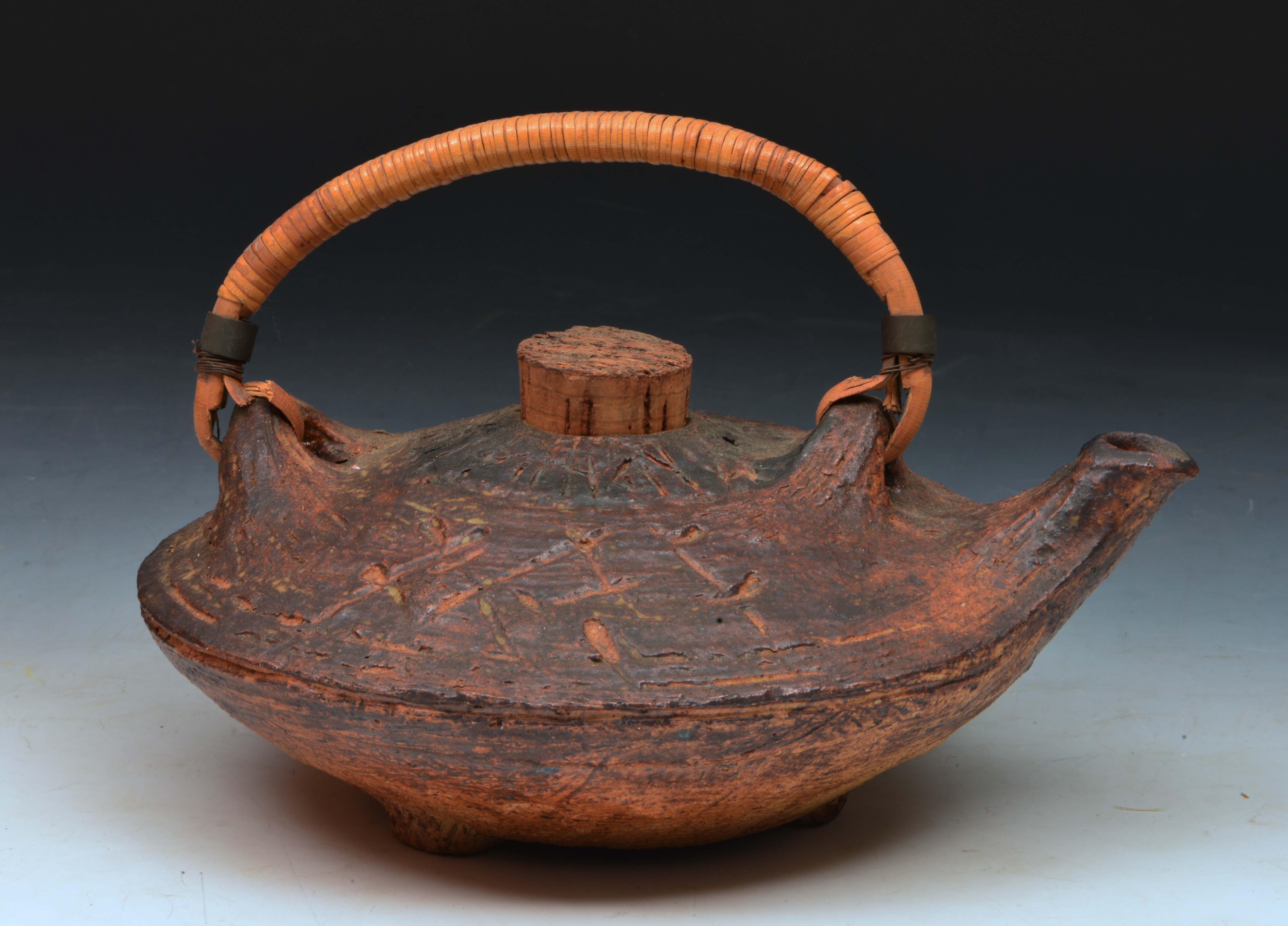 Denise K. Wren (British, 1891-1979) Japanese-style teapot, brown glaze, incised decoration and