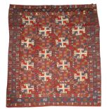 AN UZBEK FLAT WEAVE BED OR TABLE COVER with embroidered red, white and blue hooked motif, 239 x