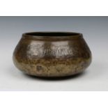 AN EARLY SYRIAN OR EGYPTIAN ENGRAVED BRASS OVOID BOWL with silver inlaid script, perhaps 15th