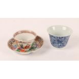 A CHINESE BLUE AND WHITE PORCELAIN TEA CUP with a four character mark to the base; together with a