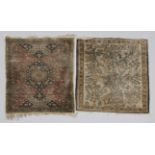 TWO PERSIAN QUM SILK MATS, one with 'Tree of Life' decoration, 76 x 59cm, the other with a central