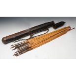 A COLLECTION OF SIXTEEN ANTIQUE TRIBAL ARROWS with steel blades and bamboo shafts contained within a