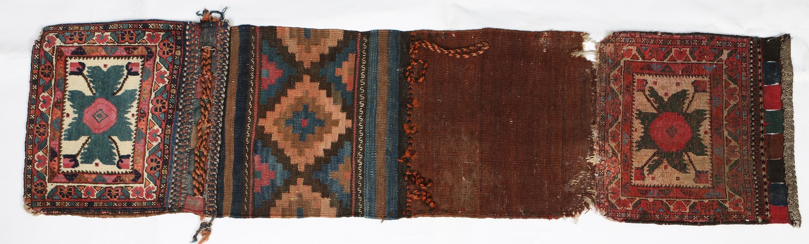 AN AFSHAR KHORJIN with flat weave back and stylised brick red and green foliate decoration, 90 x