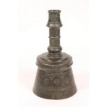 AN 18TH CENTURY OTTOMAN TINNED COPPER CANDLE HOLDER constructed in two parts of bell form with