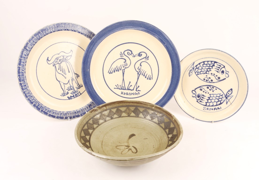 A GROUP OF THREE MBEYA (TANZANIA) BLUE AND WHITE POTTERY PLATES with bird, animal and fish