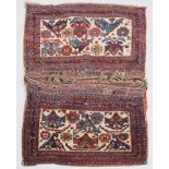 A PAIR OF LATE 19TH CENTURY AFSHAR WHITE GROUND BAGS complete with brocaded plain weave and flat