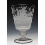 AN ANTIQUE LARGE GLASS GOBLET with country house, windmill, palm tree and grapevine decoration, 20.