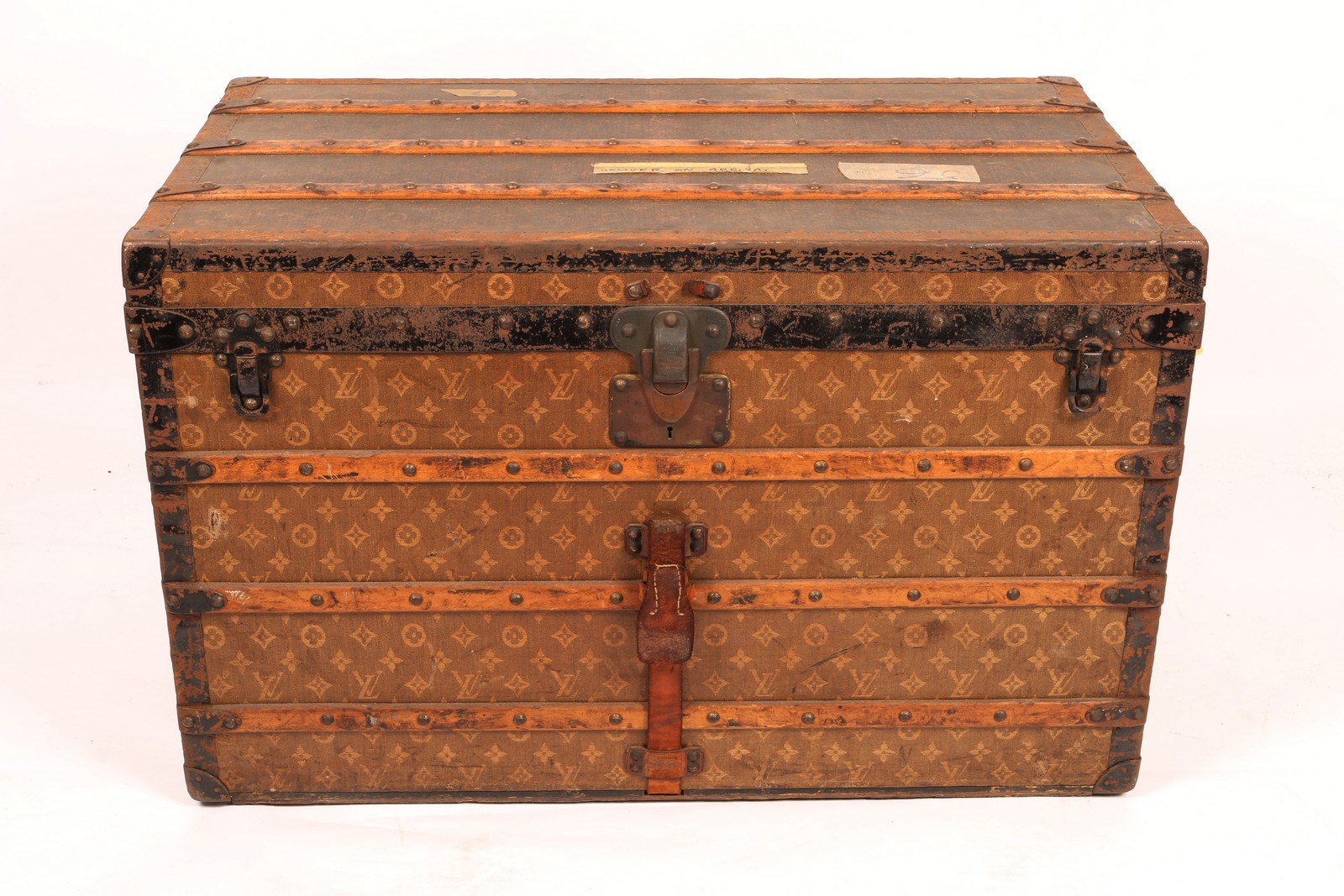 A LOUIS VUITTON CABIN TRUNK with monogram decoration, the lined interior with two trays, labelled