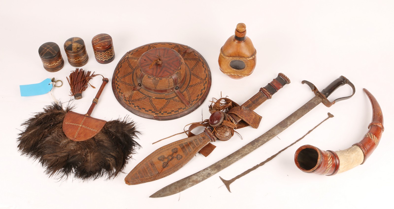 A GROUP OF ARTEFACTS from Sierra Leone circa 1926 to 1936 to include a chief's straw work and