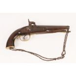 AN OLD FLINTLOCK PISTOL with brass mounts and wooden stock