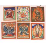 A GROUP OF SIX MONGOLIAN MINIATURE PAINTINGS OR THANGKAS each with a study of a Deity, approximate