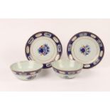 A PAIR OF 18TH CENTURY CHINESE PORCELAIN BOWLS with cobalt blue and iron red enamel decoration and a