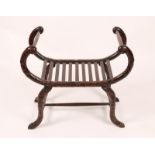 A CHINESE CARVED ROSEWOOD WINDOW SEAT with slatted base and shaped supports, 70cm wide