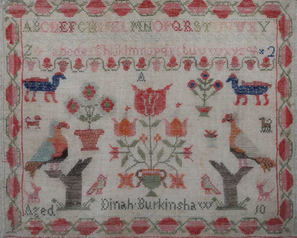 A VICTORIAN GROS POINT NEEDLEWORK SAMPLER with tulip, alphabet and bird decoration by Dinah - Image 2 of 2