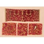 A GROUP OF FOUR ANTIQUE ITALIAN, PROBABLY VENETIAN TEXTILE FRAGMENTS of lion and crown motif,