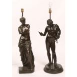 A PAIR OF BRONZE LAMPS in the form of classical figures after the Antique, 74cm high overall (2)