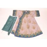 A CHINESE PALE LILAC SILK COAT with gold thread decoration within a blue border and a length of