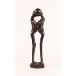 AN EAST AFRICAN MAKONDE WOOD GROUP of lovers signed M. Ambelikola, 36.5cm high and a Masai