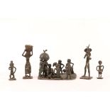 A GROUP OF FIVE ASHANTI MINIATURE METAL FIGURES TO INCLUDE a large group attending a lizard fight,