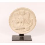 AN EARLY ITALIAN, PERHAPS VENETIAN, CARVED STONE ROUNDEL depicting an eagle attacking a lion, 30cm