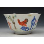 A CHINESE PORCELAIN OCTAGONAL BOWL decorated cock, hen and chicks, 12cm wide