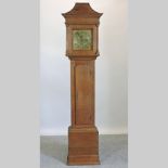 An 18th century oak cased longcase clock