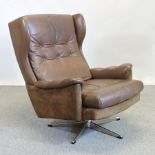 A 1970's Danish brown leather upholstere