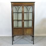 An Edwardian mahogany glazed display cab