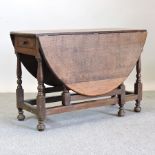 An oak gateleg table, 113cm