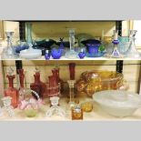 Two shelves of Victorian and later glass
