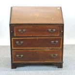 An Edwardian mahogany and inlaid bureau,