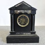 A Victorian black slate mantel clock, 40