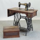 A Victorian Singer sewing machine, on a