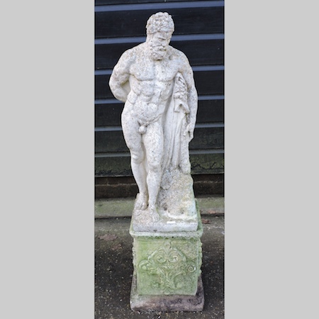 A reconstituted stone figure of Hercules