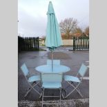 A blue painted metal garden table, 93cm,