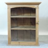 A Victorian pine glazed hanging cabinet,