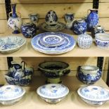 Two shelves of blue and white pottery, t