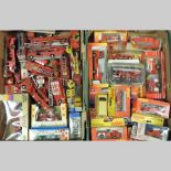 Two boxes of model toy fire engines