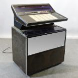 A 1970's Rockola juke box, 87cm