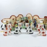 A collection of Staffordshire style figu