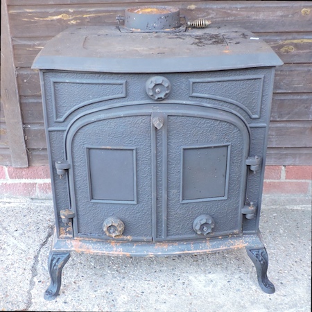 A black painted cast iron wood burning s