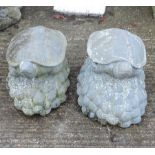 A pair of carved stone models of turtles