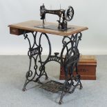 A Victorian Pfaff sewing machine, on a t