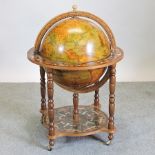 A globe drinks cabinet, on stand, 100cm